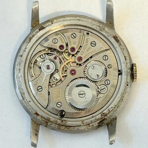 Piezas del reloj Wittnauer Revue 11TN Movimiento Horquilla Ruedas Puente de resorte Esfera imagen 2