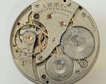 Reloj de bolsillo Waltham Grade 620, movimiento parcial, horquilla de equilibrio, resorte, puente, esfera