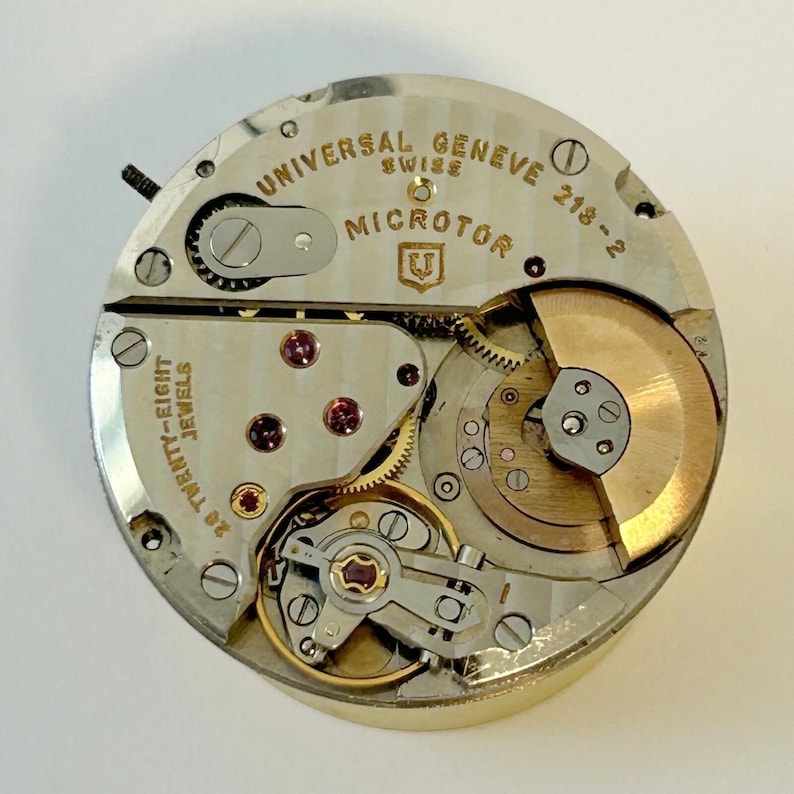 Universal Geneve Polerouter Cal 218-2 Watch Parts Movement Balance Fork Spring image 1