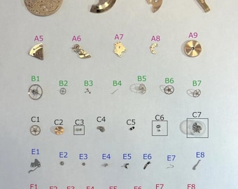 Peças do mecanismo do relógio Omega Cal 565: Diapasão do balanço, roda, mola, ponte, escape 2