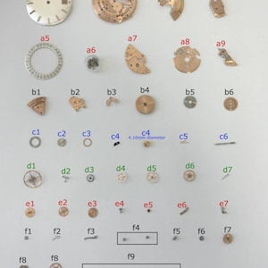 Omega Cal 562 Watch Movement Parts Balance Fork Wheel Spring Bridge 6