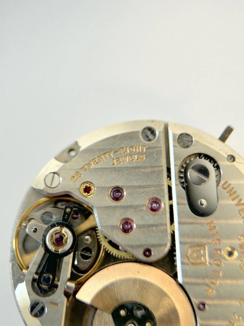 Universal Geneve Polerouter Cal 218-2 Watch Parts Movement Balance Fork Spring image 4