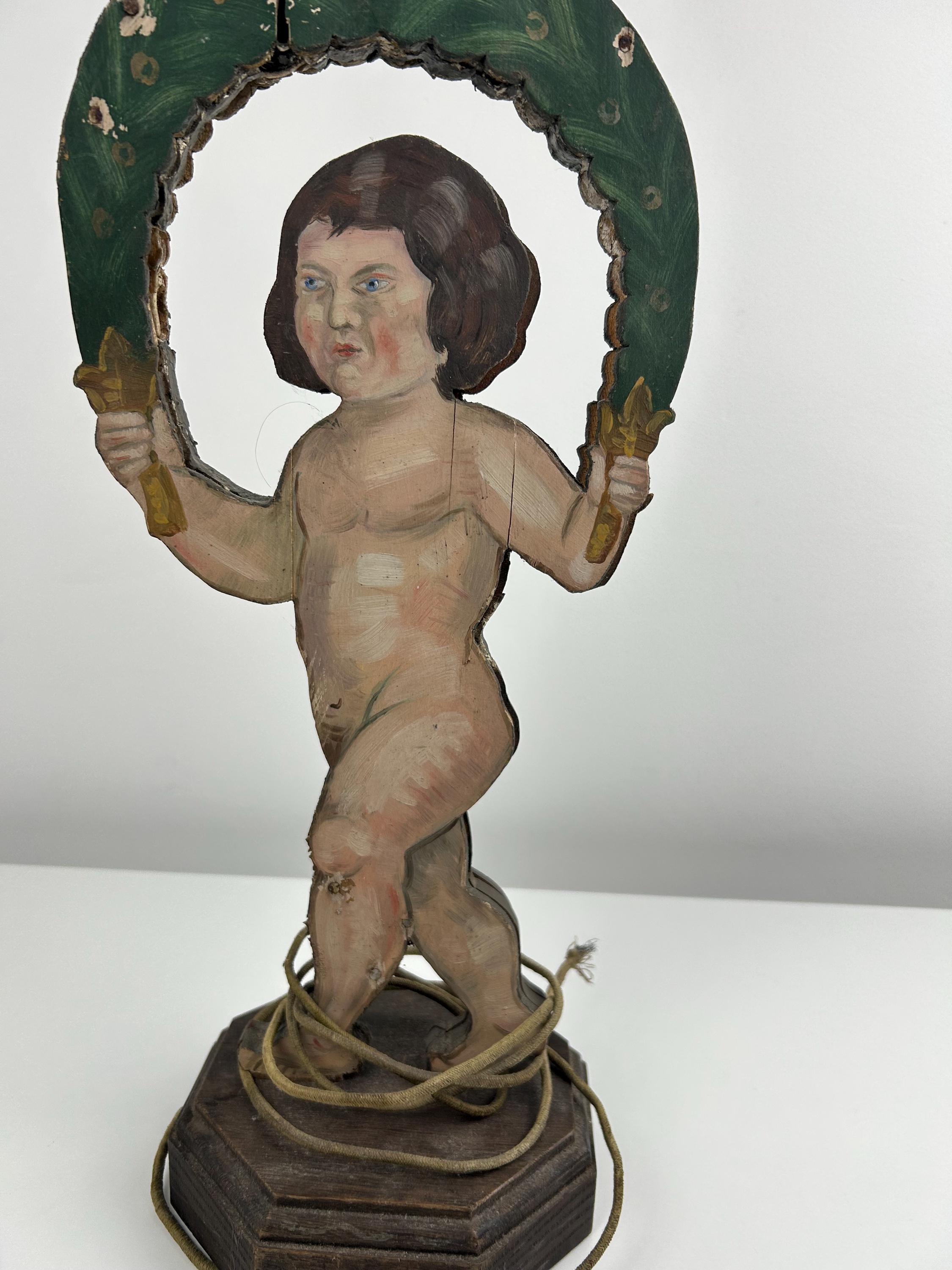 Antiker Holzleuchter mit Putte