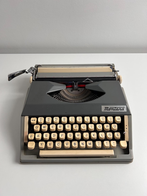 Vintage Reiseschreibmaschine Montana Graubeige 1950er