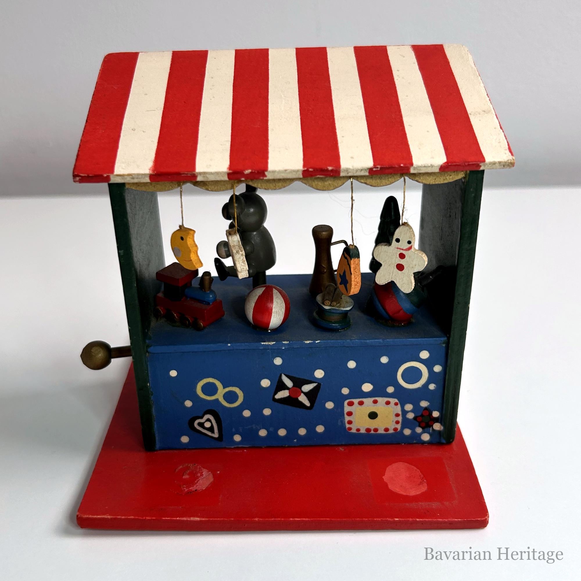 Carillon mercatino di Natale, bancarella di giocattoli in legno 13 cm