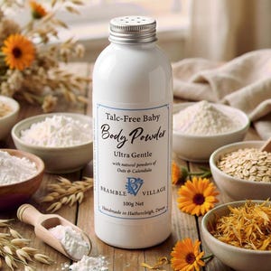 May include: A white bottle of baby body powder with a silver lid, labelled "Talc-Free" and "Ultra Gentle". The image includes bowls of oats, powder, and calendula flowers. The bottle contains 100g net.