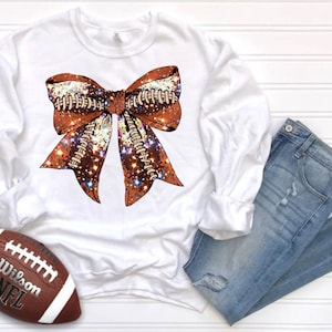 Football Sparkle Bow Coquette SweatShirt, Women’s Football Sweatshirt, Sparkle Football Sweatshirt, Sweatshirt