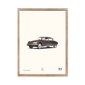 May include: An illustration of a brown 1975 Citroen DS car with a white roof, in a vintage style. The image is framed with a wood frame and includes the text "Prints Carousel", "DS", "1975", and "France".