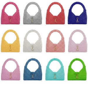 May include: A collection of twelve beaded handbags in various colors, including pink, silver, red, blue, yellow, white, and green. Each bag features a top handle and a clasp closure. The bags are arranged in a grid pattern.
