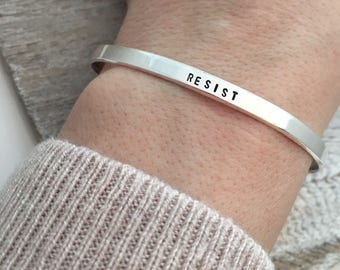 Resist Bracelet  - Sterling silver cuff bracelet  - hand stamped jewelry - skinny cuff - stacking bracelets - Inspirational Gift for her