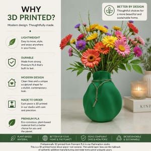 May include: A green 3D printed vase with a rounded, wavy shape and a thin twine cord tied around its neck. The vase holds a vibrant bouquet of colourful gerbera daisies in shades of red, orange, yellow, and pink, with green leaves and stems.