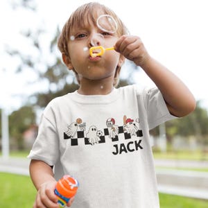 Camiseta fantasma de Halloween para niños. Camiseta Heavy Cotton™ para niños. Camiseta de niño personalizada para Halloween