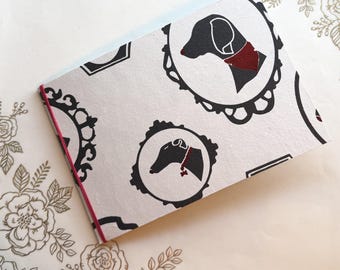 4x6 mini photo album, dog silhouettes with red foil, made from chipboard/cereal box, holds 12 photos, pet memorial book