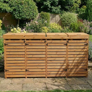 May include: A large, rectangular wooden bin storage unit featuring four separate compartments with slatted front panels and hinged lids. Each section includes a small black metal handle on the lid and black metal hinges on the doors.