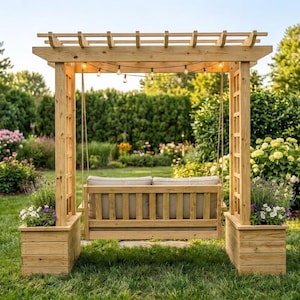 May include: A wooden pergola swing set featuring a natural light brown finish, two integrated square planters at the base, a slatted bench seat with beige cushions, and a string of small round lights suspended from the top crossbeams.