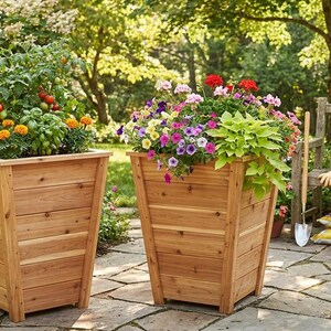 May include: Two wooden planter boxes filled with colorful flowers and plants. One box has tomatoes and basil, the other has a variety of flowers. A sign reads "DIY Garden Planter Box Plans - Easy Build!"