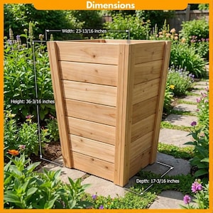 May include: A wooden planter box with dimensions displayed. The height is 36-3/16 inches, width is 23-13/16 inches, and depth is 17-3/16 inches. The planter is made of light-colored wood and is surrounded by greenery.