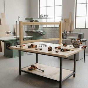 May include: A wooden workbench with a metal frame, featuring a wire mesh panel. The workbench is 183 cm long, 153 cm high, and 208 cm wide. Various tools, including a circular saw and drills, are arranged on the surface.