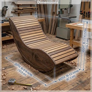 May include: A curved wooden lounge chair with horizontal slats. Dimensions are 153.8 cm in depth, 67.3 cm in width, and 154.2 cm in height. The chair features a solid wood frame with a natural grain finish and a contoured seat design for support.