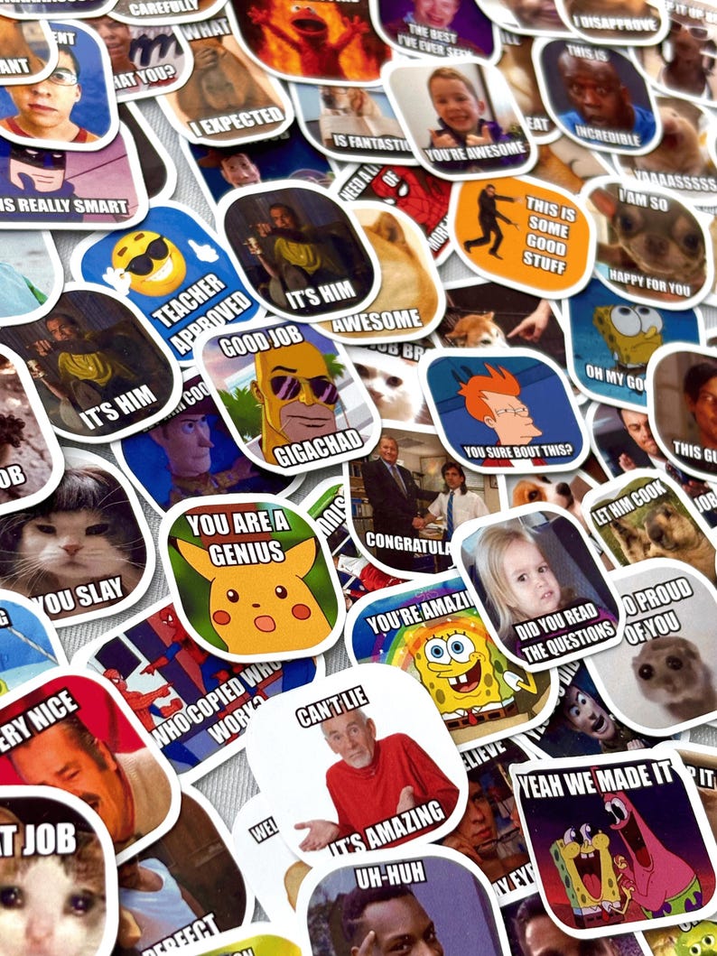 May include: A collection of colorful, die-cut stickers featuring various internet memes and humorous images. The stickers include text like "You're Awesome," "Good Job," and "It's Amazing." The stickers are of various shapes and sizes.