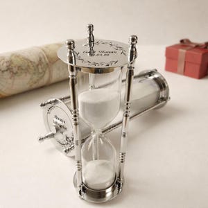 May include: A handmade wooden sign with the text "Welcome" in a playful font. The sign features a distressed white background and a dark brown border, perfect for a front door or entryway. The sign measures approximately 12 inches wide and 6 inches tall.