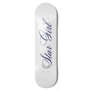 May include: White skateboard featuring the navy blue script text "Star Girl". The skateboard has a rounded nose and tail, and small holes near the bottom. The board is designed for skateboarding, with a length of approximately 79 cm.