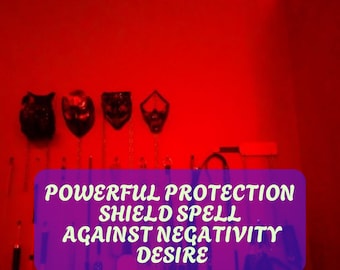 May include: A red room with a purple text overlay that reads "POWERFUL PROTECTION SHIELD SPELL AGAINST NEGATIVITY DESIRE". There are several black masks hanging on the wall and various leather straps hanging from the ceiling.