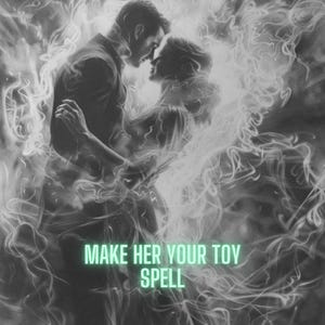 May include: A black and white image of a couple embracing, surrounded by swirling smoke. The text "MAKE HER YOUR TOY SPELL" is superimposed on the image.