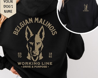 May include: A black hooded sweatshirt featuring a tan graphic of a Belgian Malinois dog head on the back with the text Belgian Malinois, Estd 1892, Working Line, Drive & Purpose. The front chest area displays a smaller matching dog head and the name Stark.