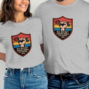 Real Men Defend Women Shirt Hoodie Sweater - Anti Misogyny Tee Pro Feminist Masculinity Graphic for Allies Activists and Respectful Men