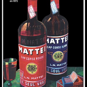 Puede incluir: Dos botellas de vino Cap Corse L.N. Mattei, una roja y otra blanca, con el texto "Le Seul Vrai" en las etiquetas. Las botellas están sobre una mesa con una caja de cerillas y una copa de vino.
