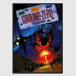 May include: A framed poster featuring the text "GROUND ZERO TEXAS" on a license plate design. The artwork depicts a futuristic scene with a robot, explosion, and a helicopter. The poster is set against a dark blue and red background.