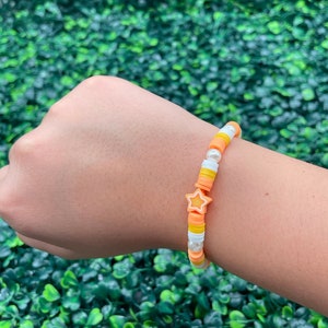 Orange star clay bead bracelet