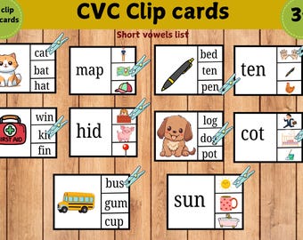 May include: Educational CVC clip cards for early learners. The cards feature colorful illustrations and words for short vowel sounds. Includes images of a cat, map, bed, dog, bus, and more. The cards are designed for children aged 3+.