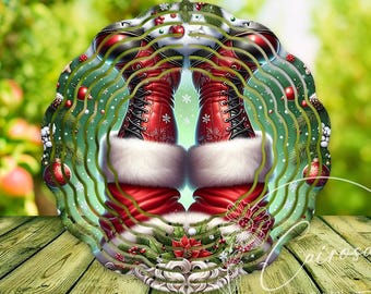 May include: A festive Christmas wreath design featuring Santa's red boots with white fur trim. The boots are set against a green and red wreath adorned with ornaments and snowflakes, creating a holiday theme.