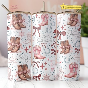May include: Three white insulated tumblers with a repeating pattern of cowboy boots, bows, hats, horseshoes, and stars in pink, brown, and blue. Each tumbler has a gold-colored straw and a lid. The tumblers are decorated with a Western theme.
