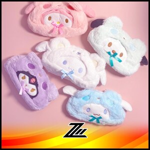 May include: Five plush character head-shaped zippered pouches. The pouches are in various colors, including pink, white, light blue, and purple. Each pouch features a different character with embroidered details.