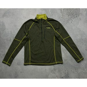 May include: A green long-sleeve shirt with yellow trim and a half-zip closure. The shirt has the word "Rab" on the front.