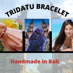 May include: Red and white braided bracelet with a silver charm. The bracelet is handmade in Bali and features the text "Tridatu Bracelet".