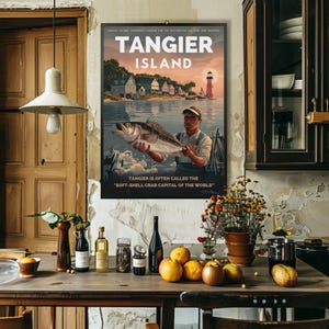 May include: A vintage-style poster advertising Tangier Island, Virginia. The poster features a colorful illustration of a man holding a fish, a lighthouse, and houses on the water. The text on the poster reads "Tangier Island" and "Tangier is often called the "Soft-Shell Crab Capital of the World."