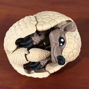 Juguete compactable de armadillo impreso en 3D