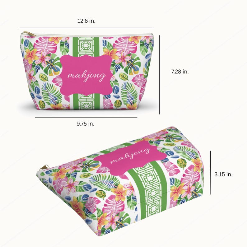 May include: A floral print cosmetic bag with the word "mahjong" in a pink frame. The bag features a zipper closure and measures 12.6 inches wide, 7.28 inches high, and 3.15 inches deep.