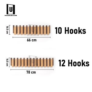 May include: Wooden coat rack with 10 hooks, measuring 66 cm long and 16.5 cm high. The rack features alternating light and dark wood slats. A second rack with 12 hooks is also shown, measuring 78 cm long and 16.5 cm high.