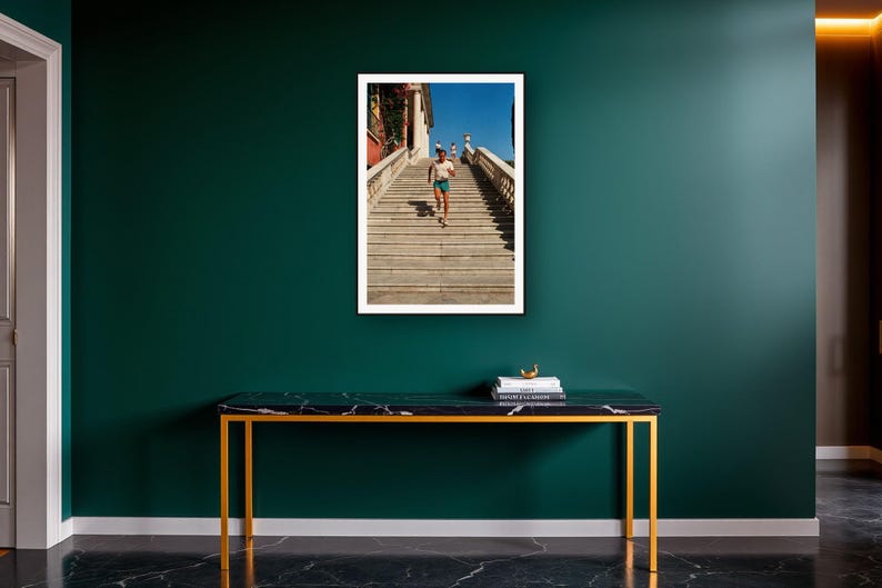 Stair Running Wall Art art print on a brass and black console vignette