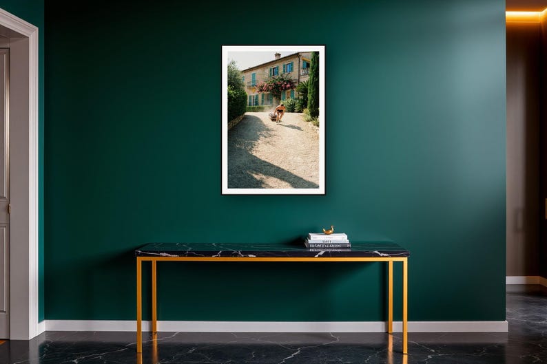 Sled Push Wall Art art print on a brass and black console vignette