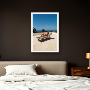 Sun Lounger Wall Art art print framed in a dark luxury bedroom
