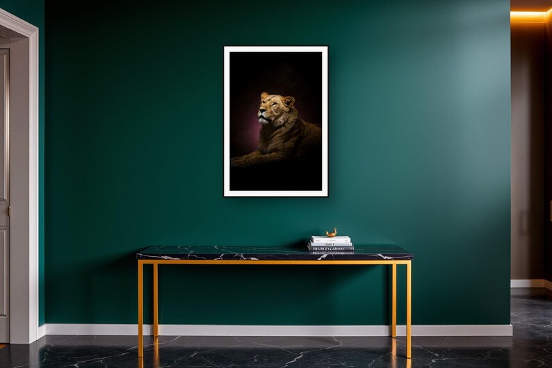 Lioness Wall Art art print on a brass and black console vignette
