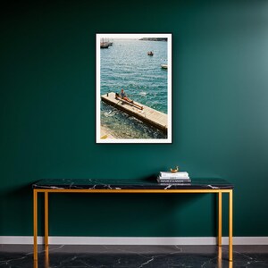 Rowing Wall Art art print on a brass and black console vignette