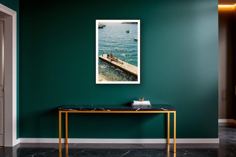 Rowing Wall Art art print on a brass and black console vignette