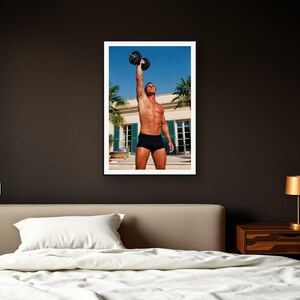 Dumbbell Press Wall Art art print framed in a dark luxury bedroom